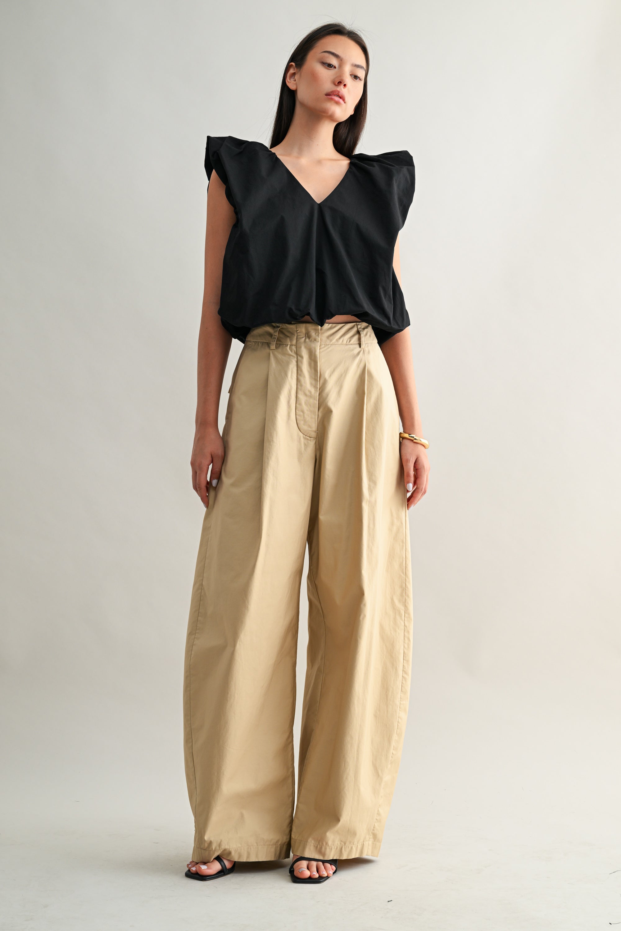 Sleeveless Bubble Hem Deep V Top