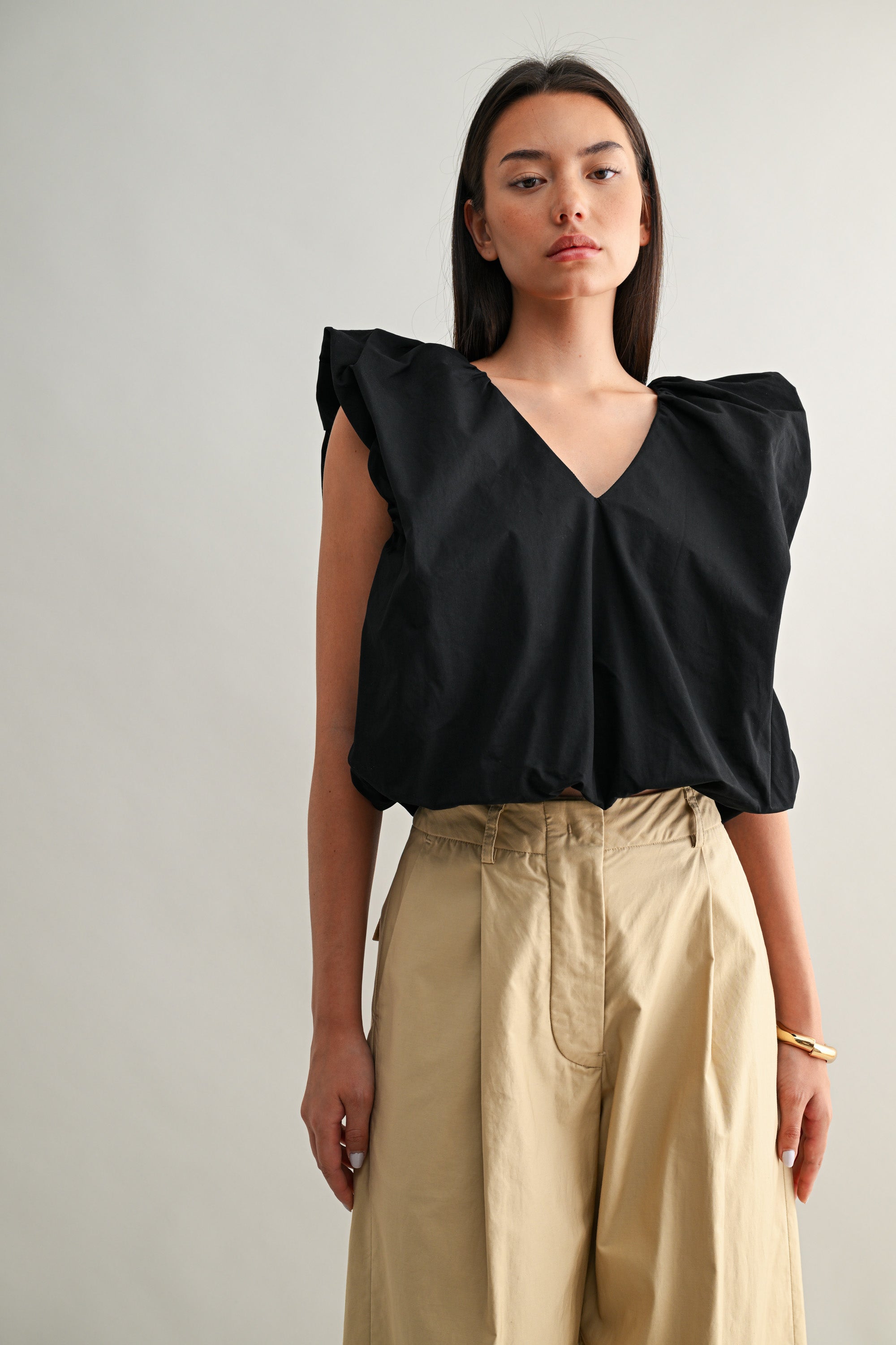 Sleeveless Bubble Hem Deep V Top